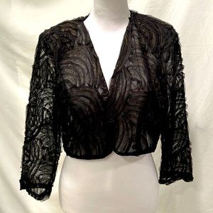 Marina bolero jacket. See through sleeves. Black with gold undertones.
